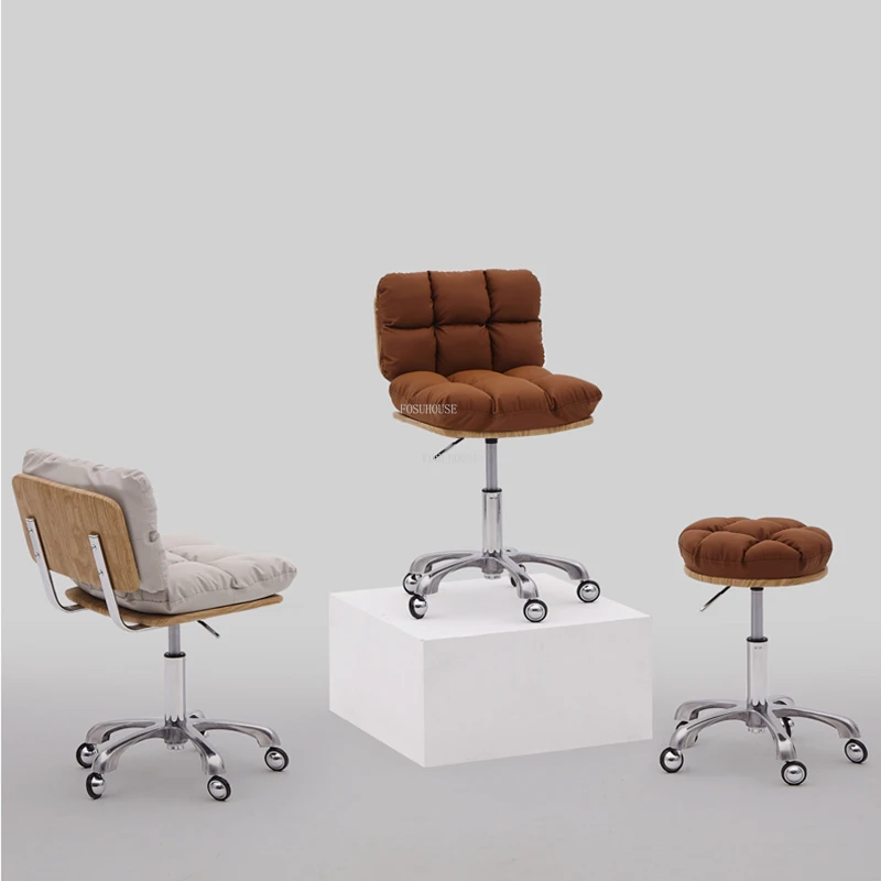 Işık lüks berber Sandalyeleri Modern Salon mobilyaları güzellik salonu Profesyonel sandalye kaldırma döner Yuvarlak tabure ev makyaj koltuğu