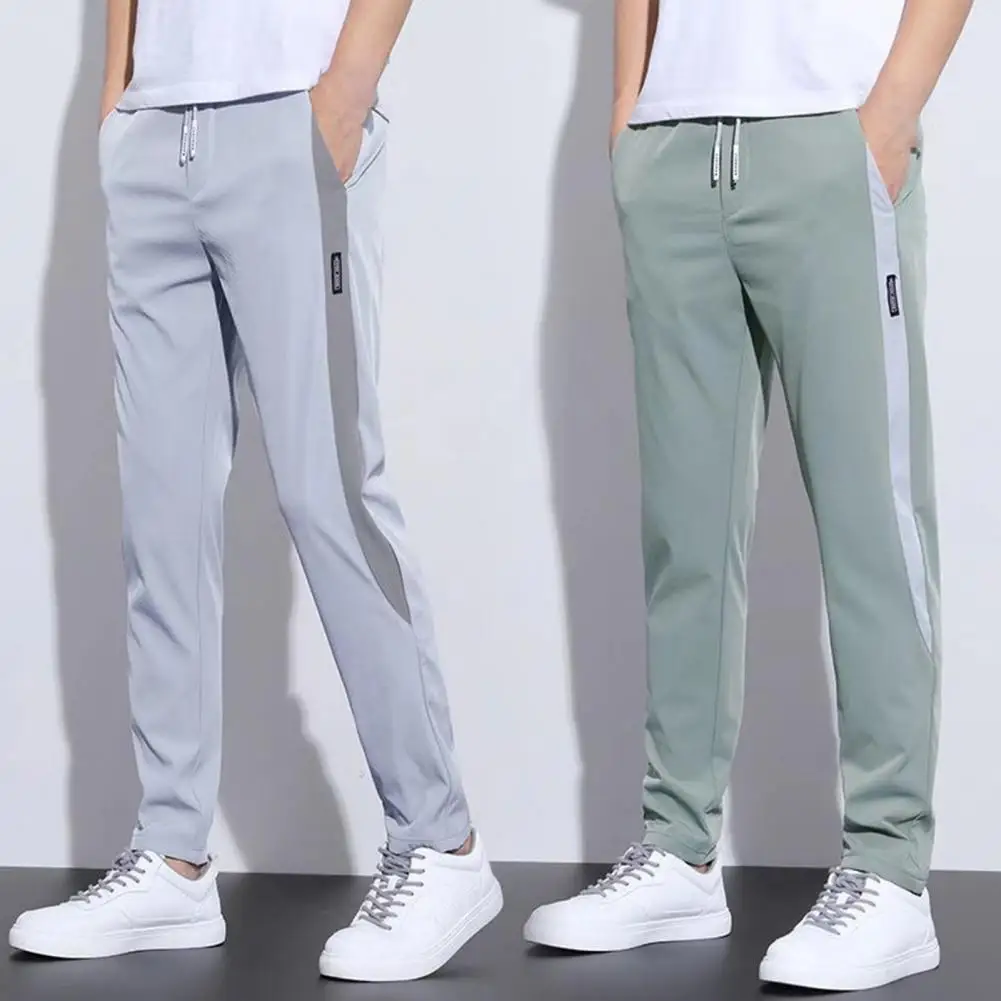 Kalem pantolon Popüler Kontrast Renk Sıkı Pantolon Dipleri Erkek Pantolon Dantel-up Dökümlü Sweatpants Spor