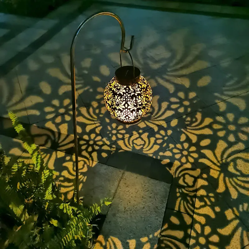 LED güneş ışığı açık bahçe lambası su geçirmez güneş lambası Retro içi boş fener ışık LED projeksiyon lambası peyzaj Yard dekor